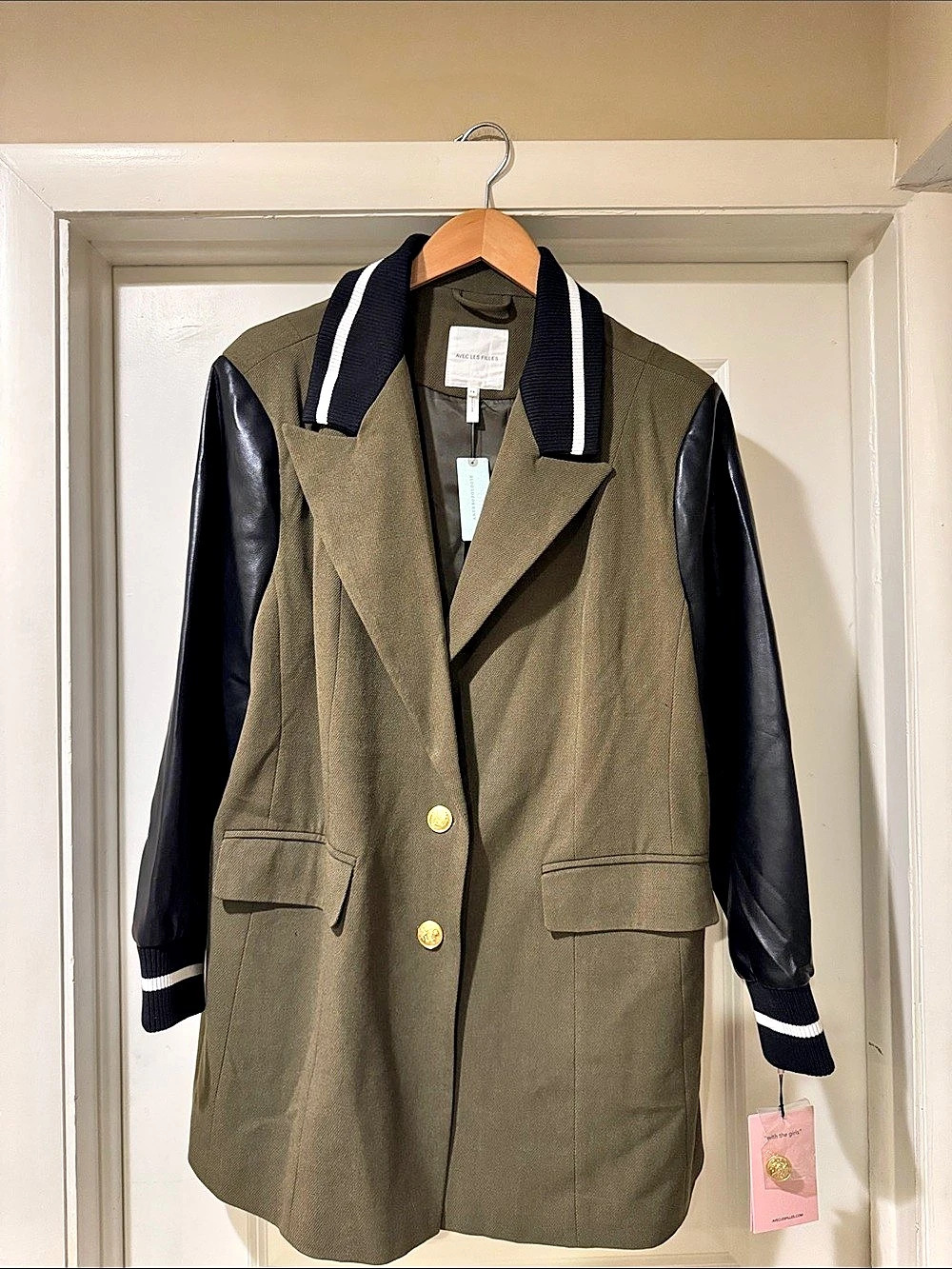 Anthropologie’s Avec Les Filles Mixed Media Olive Green and Black Cropped Varsit